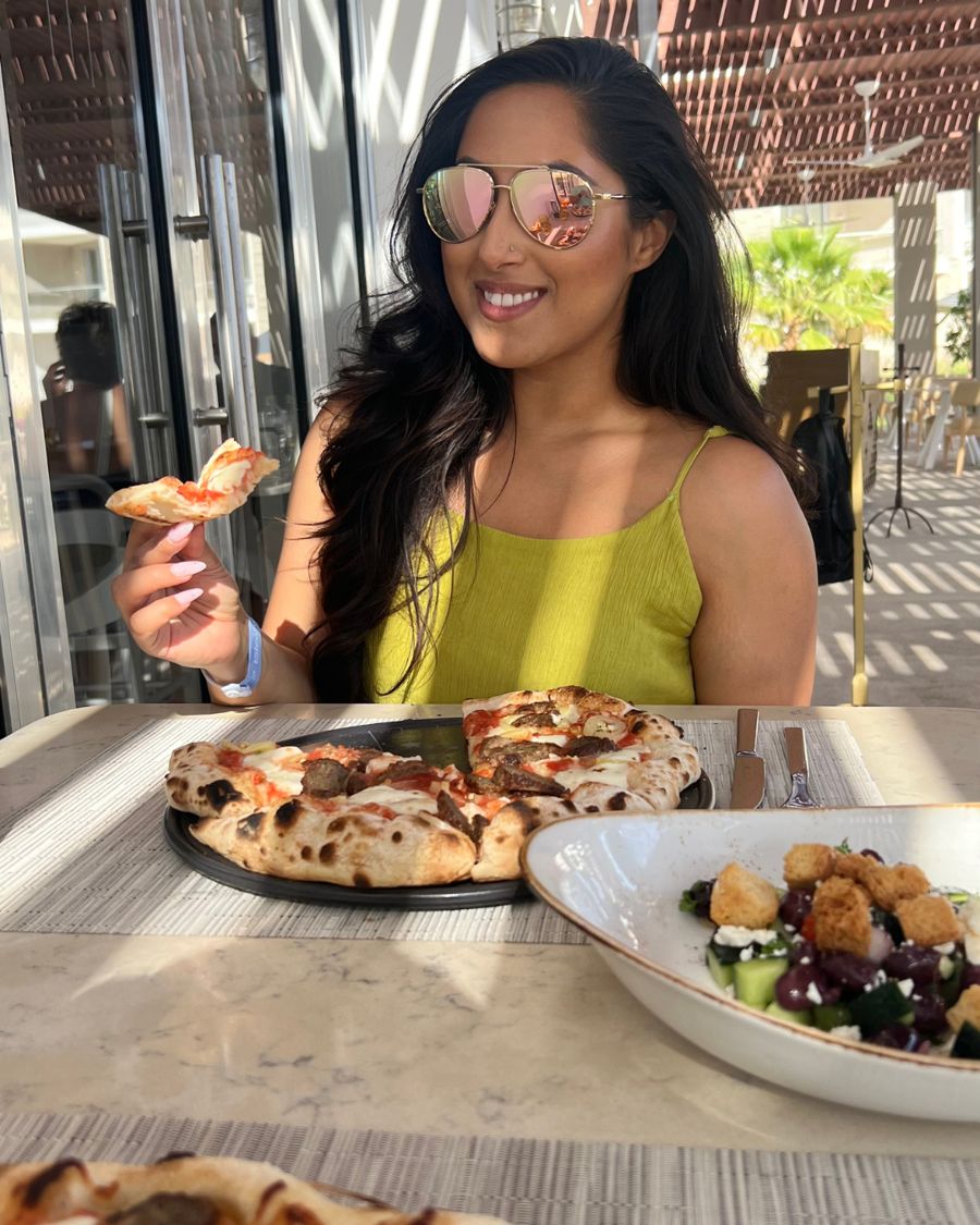 Sonia, PCOS coach, enjoying a meal